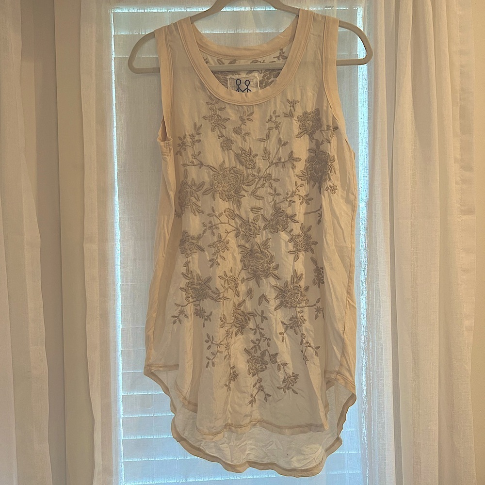 Johnny was tank top. A8